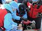 Медики в Ванкувере пытаются спасти Нодара Кумариташвили. Фото  (c)AFP