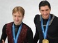Евгений Плющенко (слева) и Эван Лайсачек. Фото (c)AFP