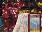 Хоккеисты сборной Белоруссии празднуют гол в ворота немцев. Фото (c)AFP